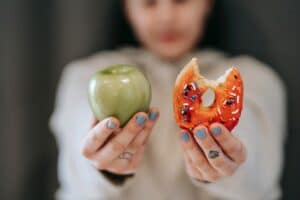 picture of a choice, an apple or a donut
